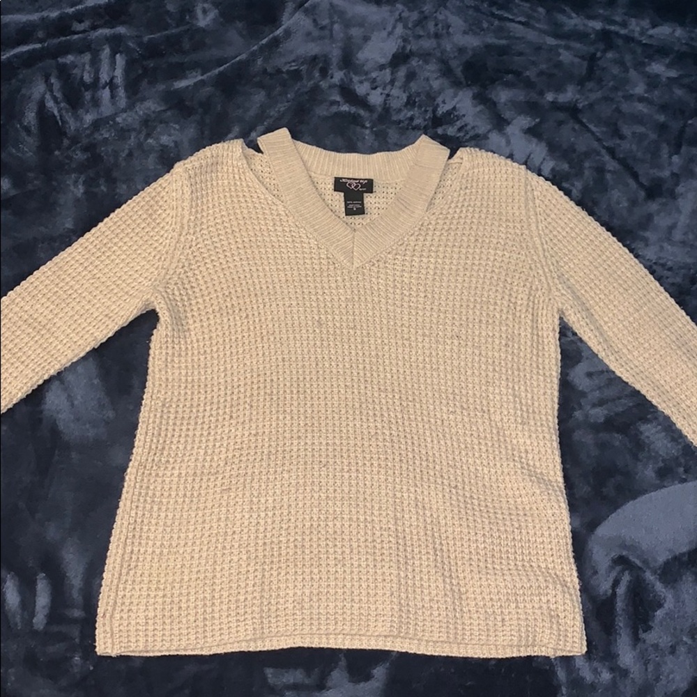Tan Warm Sweater, with two cuts for style.